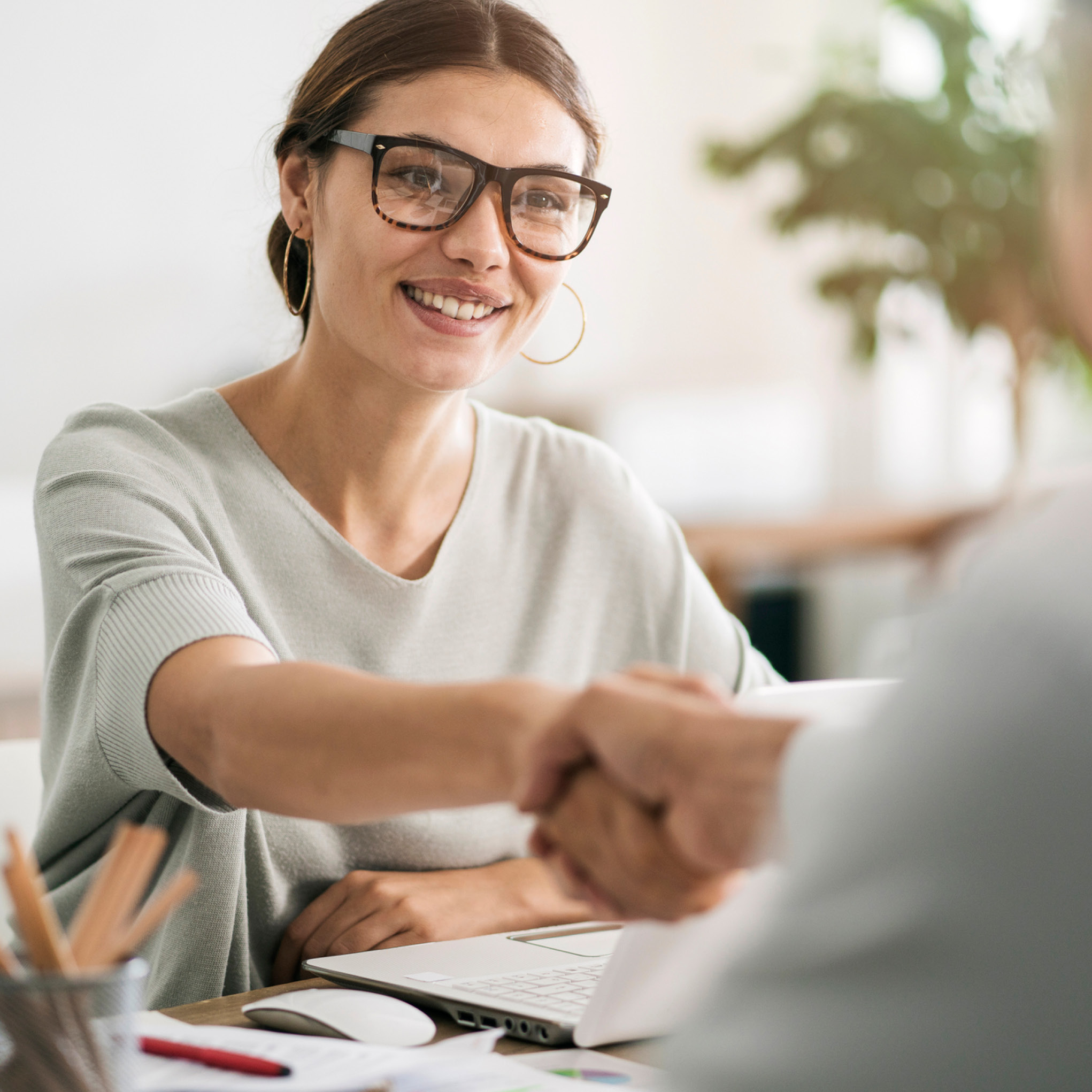 business woman shaking hands